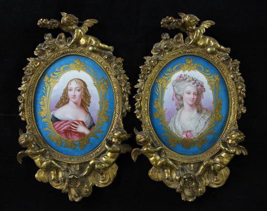 A pair of ormolu mounted Sevres style porcelain wall plaques, late 19th century, 24cm